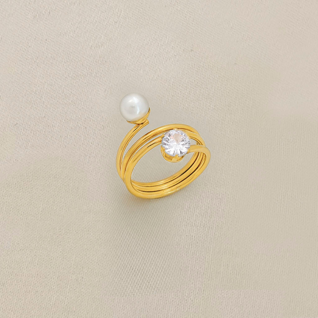 ANILLO EN ACERO DORADO CON PERLA